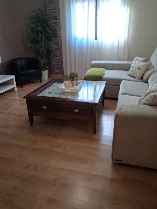 Mesa de centro de salon Madera maciza con cristal.