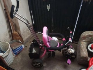 Triciclo rosa para niña