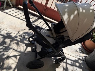 Carrito de bebé y bolso