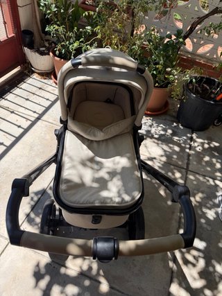 Carrito de bebé y bolso