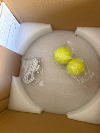 Lanzador de pelotas para mascotas