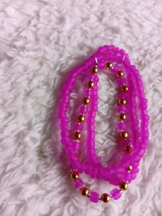 Confezione di 3 Braccialetti Rosa e Dorati
