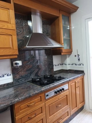 Cocina madera y cristal
