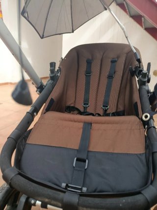 Passeggino con ombrellone