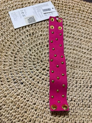 Pulsera con chapas doradas y rosa