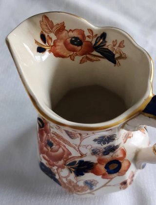 Jarra porcelana inglesa perfilada oro