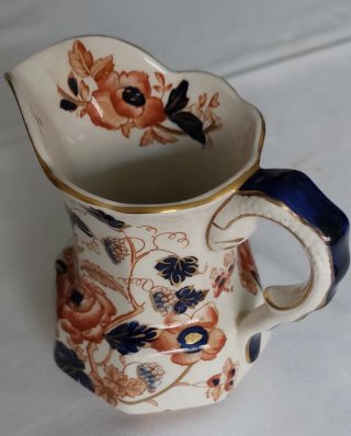 Jarra porcelana inglesa perfilada oro