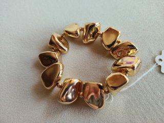 Bracciale dorato con maglie irregolari