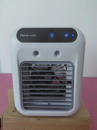 Mini humidificador y ventilador aire frío
