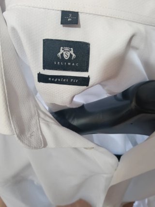 Traje de novio azul con chaleco