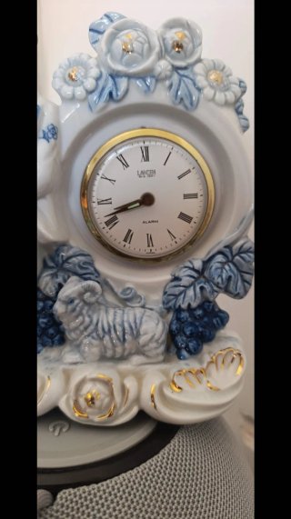 Reloj de porcelana figura cuerda años 70
