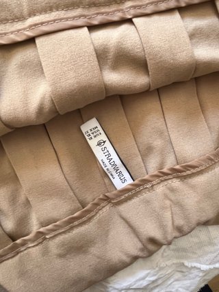 Falda plisada beige