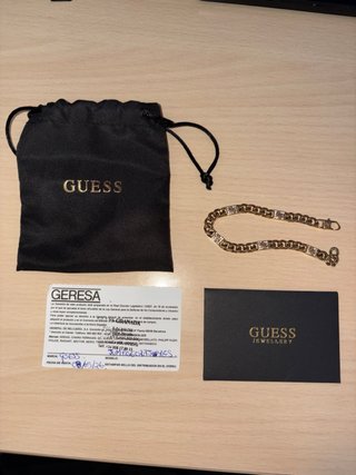 Pulsera Guess Dorada.