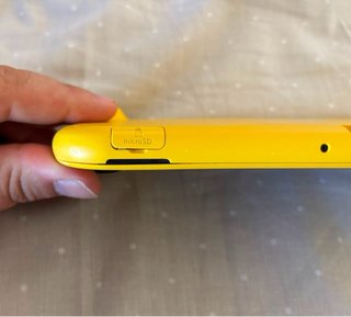Nintendo Switch Lite Amarilla + Funda
