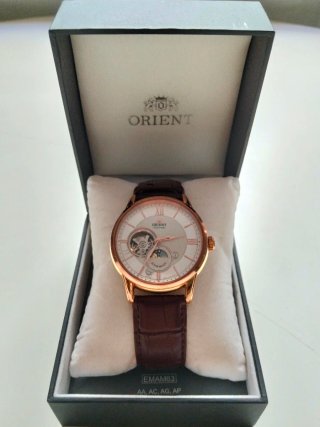 Reloj Orient Bambino Sun & Moon Open Heart.