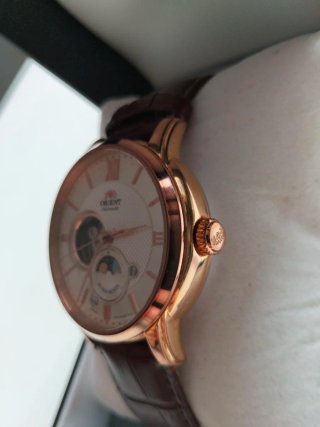 Reloj Orient Bambino Sun & Moon Open Heart.