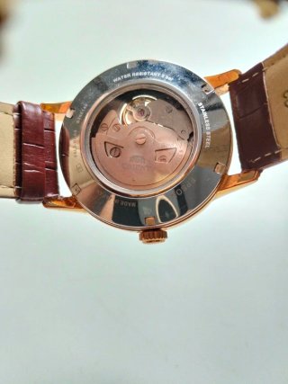 Reloj Orient Bambino Sun & Moon Open Heart.