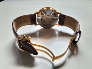 Reloj Orient Bambino Sun & Moon Open Heart.