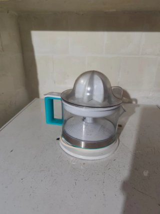 Exprimidor eléctrico