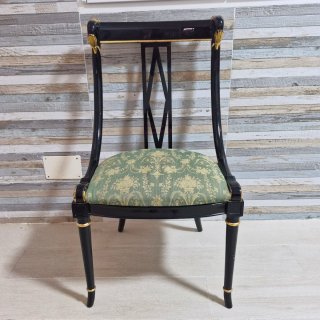 Silla de comedor negra con tapicería verde
