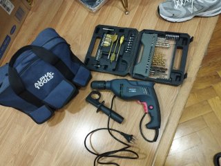 Taladro percutor Alpha Tools con maletín