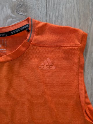 Camiseta running Adidas sin mangas naranja