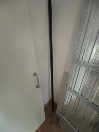 Puerta corredera con cajón empotrable