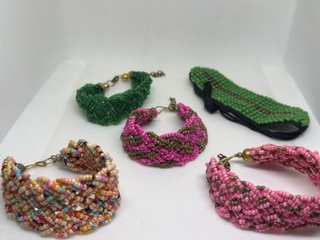 Pulsera artesanal trenzada fucsia y marrón