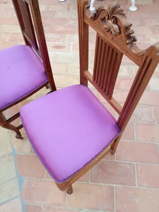 Sillas de madera de nogal talladas