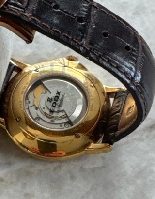 Reloj Edox Automático Esqueleto Dorado Negro