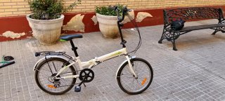 Bicicleta plegable 20 con luz y candado, casco