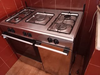 Cocina de gas 5 fuegos con horno