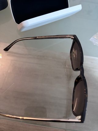 Gafas de sol Calvin Klein negras y marrones origin
