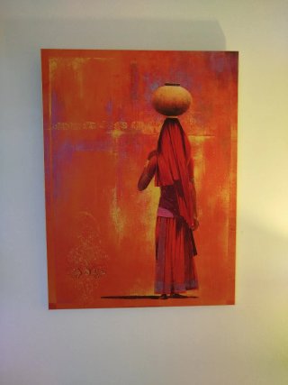 Cuadro mujer árabe tonos anaranjados