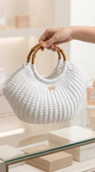Borsa uncinetto artigianale a forma di conchiglia