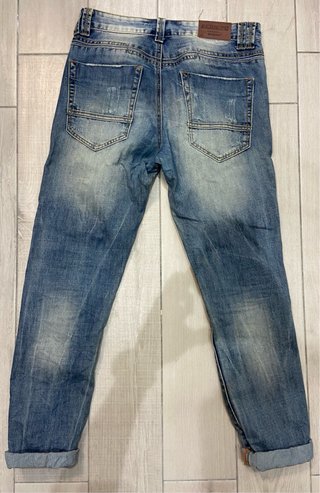 Jeans strappati uomo donna