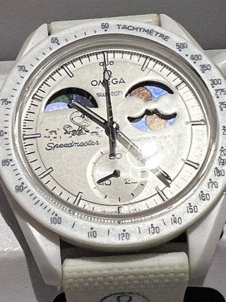 Omega x Swatch Mission to Earth Moonshine Gold