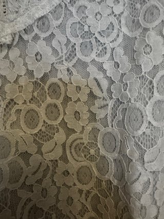 Blusa encaje y plumeti talla M