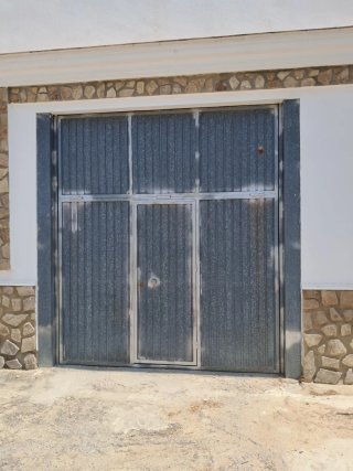 Puerta de garaje galvanizada 290x250