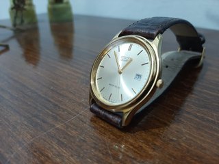 Reloj Citizen de vestir  dorado  correa  marrón