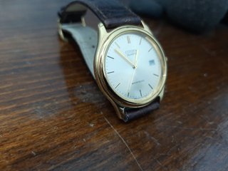 Reloj Citizen de vestir  dorado  correa  marrón