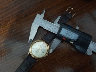 Reloj Citizen de vestir  dorado  correa  marrón