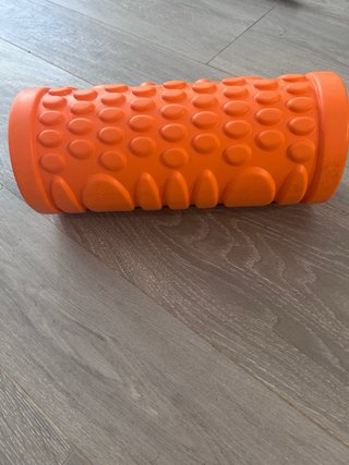 Rodillo de masaje naranja texturizado
