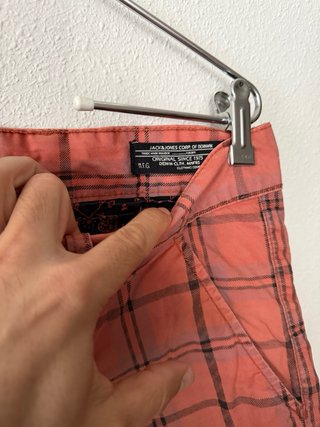 Pantalón corto a cuadros naranja y negro M