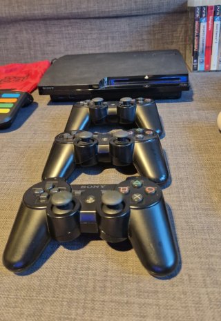 Pack PlayStation 3 Slim + mandos Move, Buzz y jueg