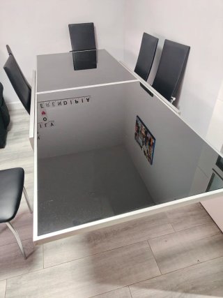 Mesa extensible negra con 6 sillas