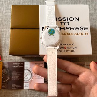 OmegaxSwatch Mission to earthphase moonshine gold
