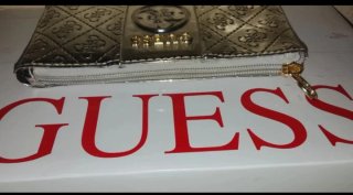 Monedero neceser Guess plateado