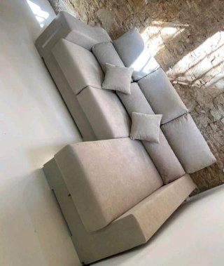 Sofá modular gris de tela
