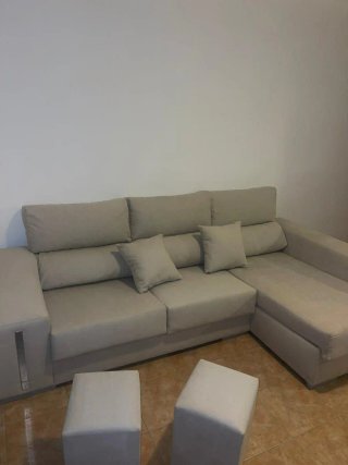 Sofá modular gris de tela